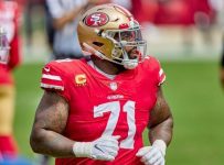 Williams stays with 49ers on historic $138M deal