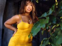 Jordyn Woods Shows Off Her Generous Curves In This Pink Skin-Tight Dress – Check Out Her Handbag Tour As Well!