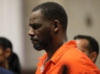 Woman alleges at trial that R. Kelly forced her to have sex with another man as punishment