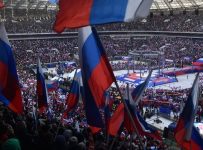 Russian Olympians face backlash over Putin rally